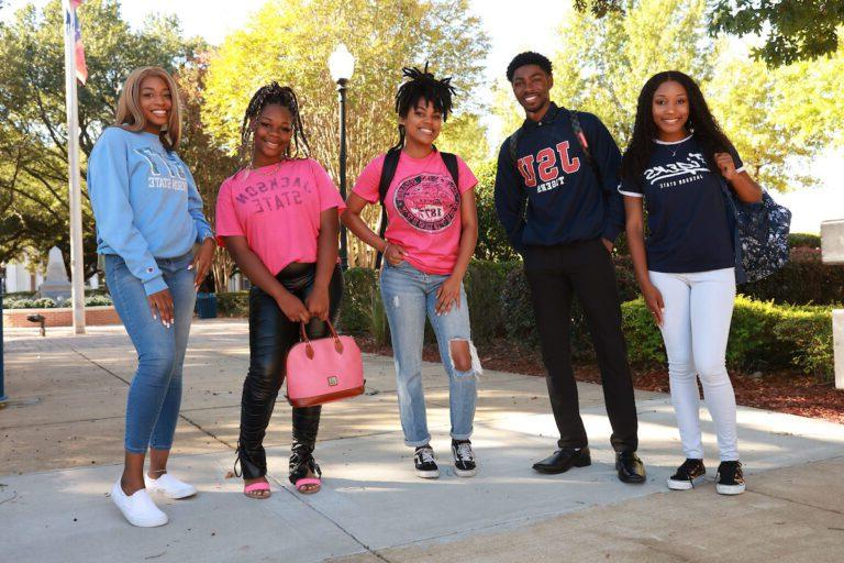 JSU students standing and smiling